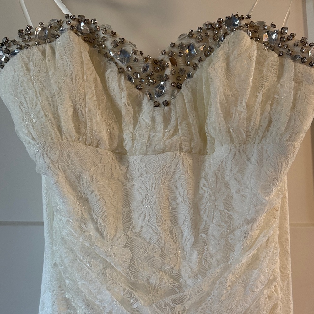 Elegant White Lace Dress with Embellished Neckline